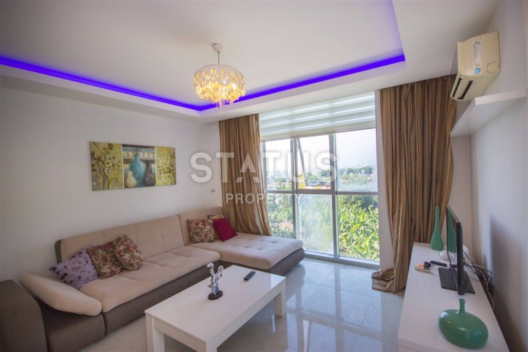 Трехкомнатные апартаменты с мебелью в районе Каргыджак, 110 м2. фото 1