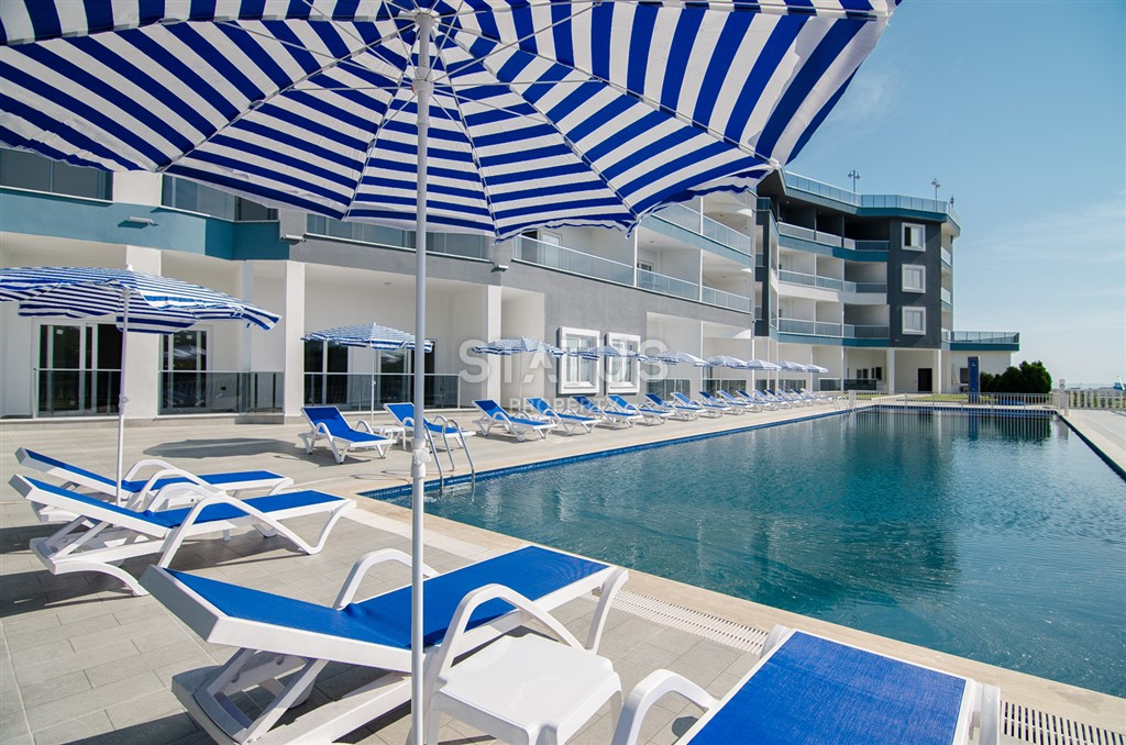 Меблированная квартира студия  в ЖК с полной инфраструктурой в Каргыджаке. 50м2 фото 4