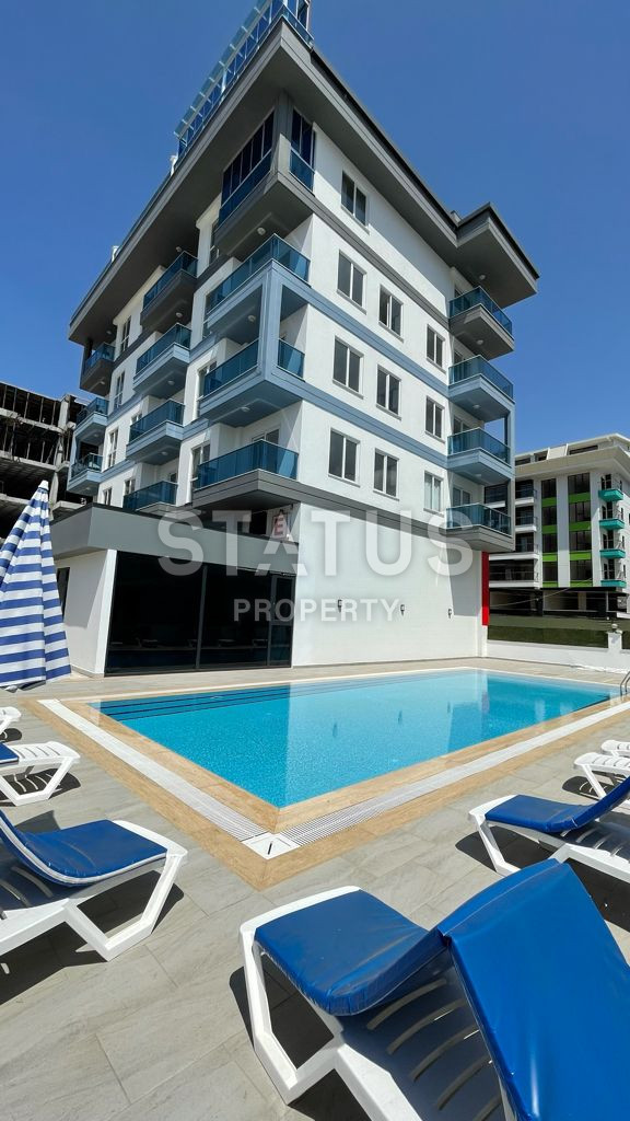 One-bedroom turnkey apartment in the first coastline in Kargicak. 55m2 фото 15