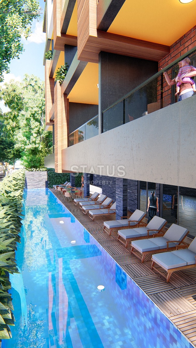 Инвестиционный проект в 150 метрах от моря в самом центре Алании фото 22