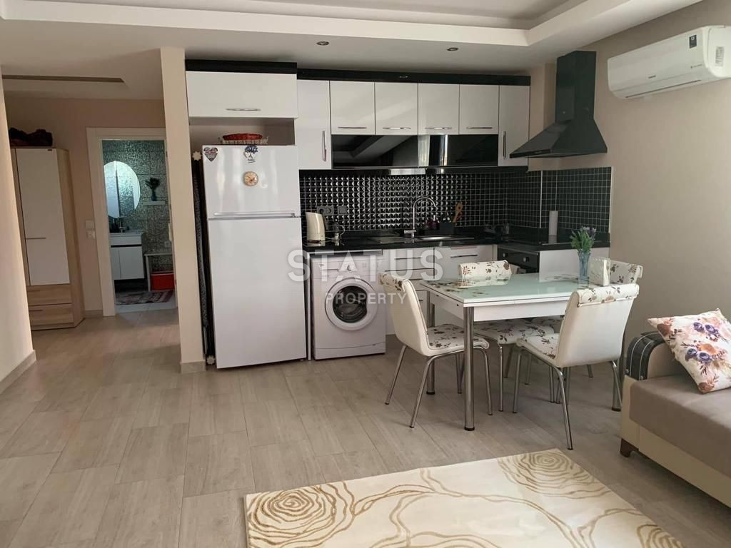 Просторные апартаменты 1+1 в трёх минутах ходьбы до моря в Кестеле. 75 м2 фото 4