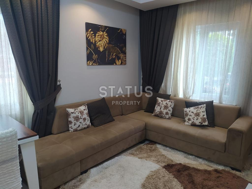 Меблированные апартаменты 1+1 в одном из лучших комплексов Махмутлара, 70 м2. фото 5