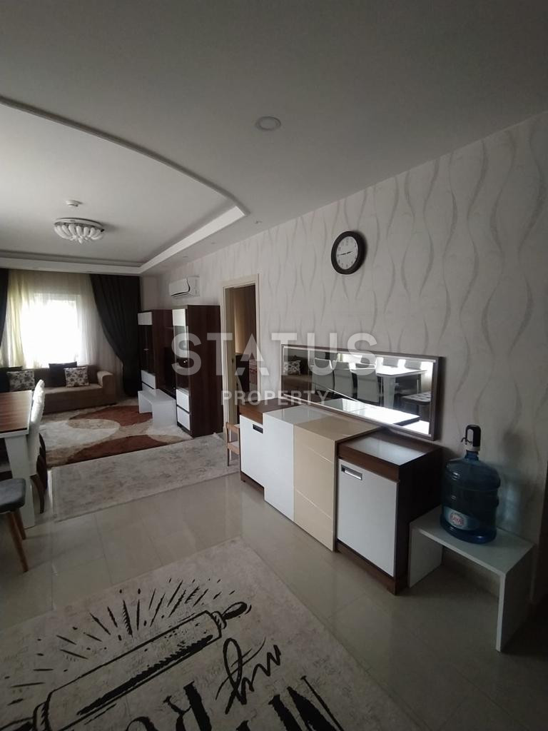 Меблированные апартаменты 1+1 в одном из лучших комплексов Махмутлара, 70 м2. фото 6