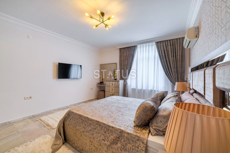 Просторная квартира 2+1 с дизайнерским ремонтом 50м от моря в Махмутларе, 125 м2. фото 19