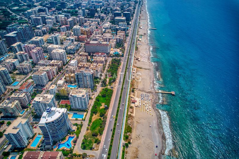 Просторная квартира 2+1 с дизайнерским ремонтом 50м от моря в Махмутларе, 125 м2. фото 26