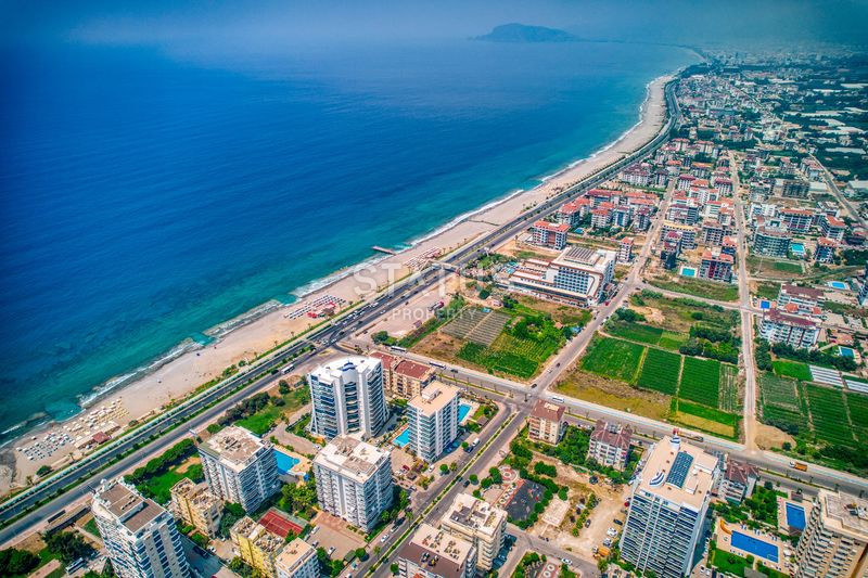 Просторная квартира 2+1 с дизайнерским ремонтом 50м от моря в Махмутларе, 125 м2. фото 31