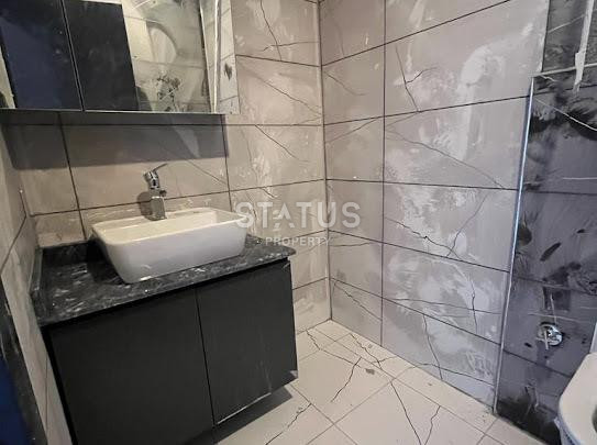 Three-room new apartment with a garden with a good location and price in OBA. 90m2 фото 8