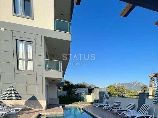 Three-room new apartment with a garden with a good location and price in OBA. 90m2 фото 9