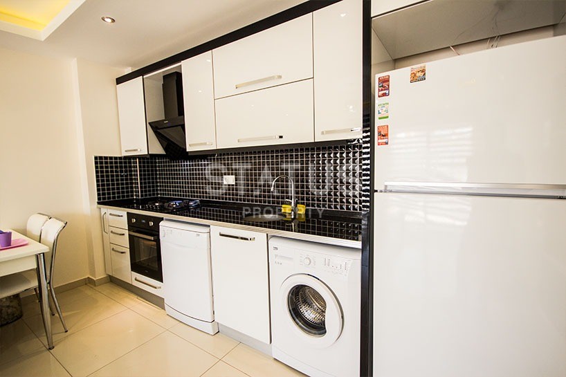 Двухкомнатная  квартира с новой мебелью в Махмутларе,65 м2 фото 4