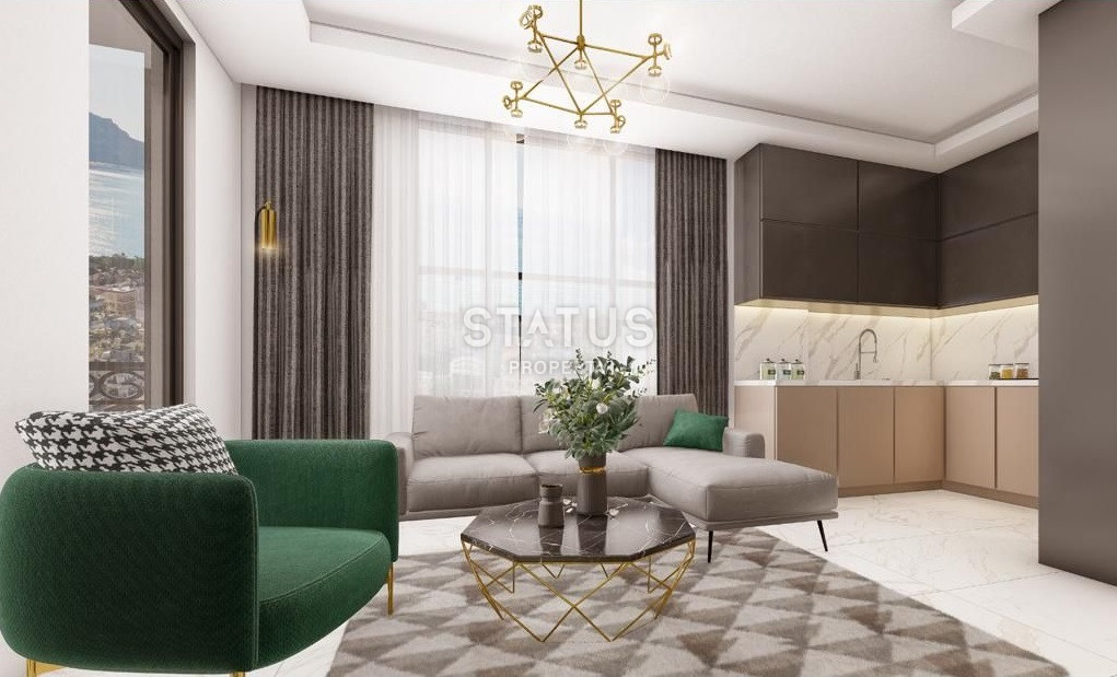 Новый проект на стадии готовности в районе Махмутлар в 950м от моря фото 3