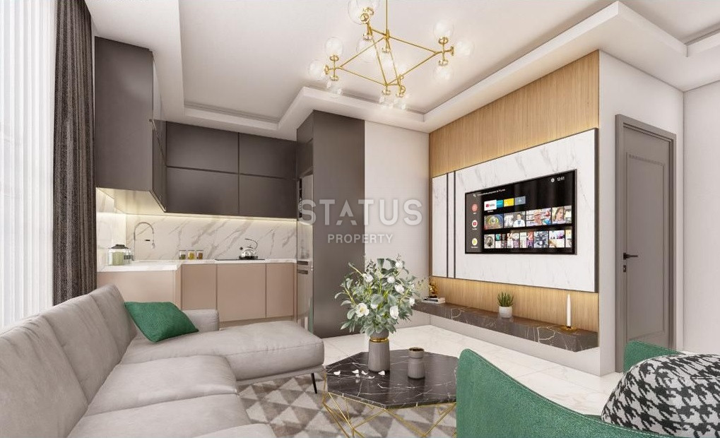 Новый проект на стадии готовности в районе Махмутлар в 950м от моря фото 4