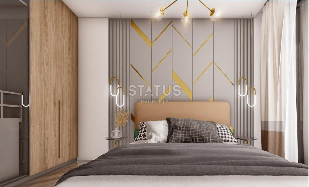 Новый проект на стадии готовности в районе Махмутлар в 950м от моря фото 5