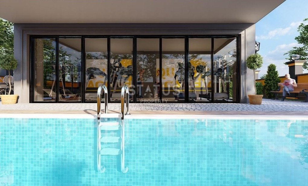 Новый проект на стадии готовности в районе Махмутлар в 950м от моря фото 8