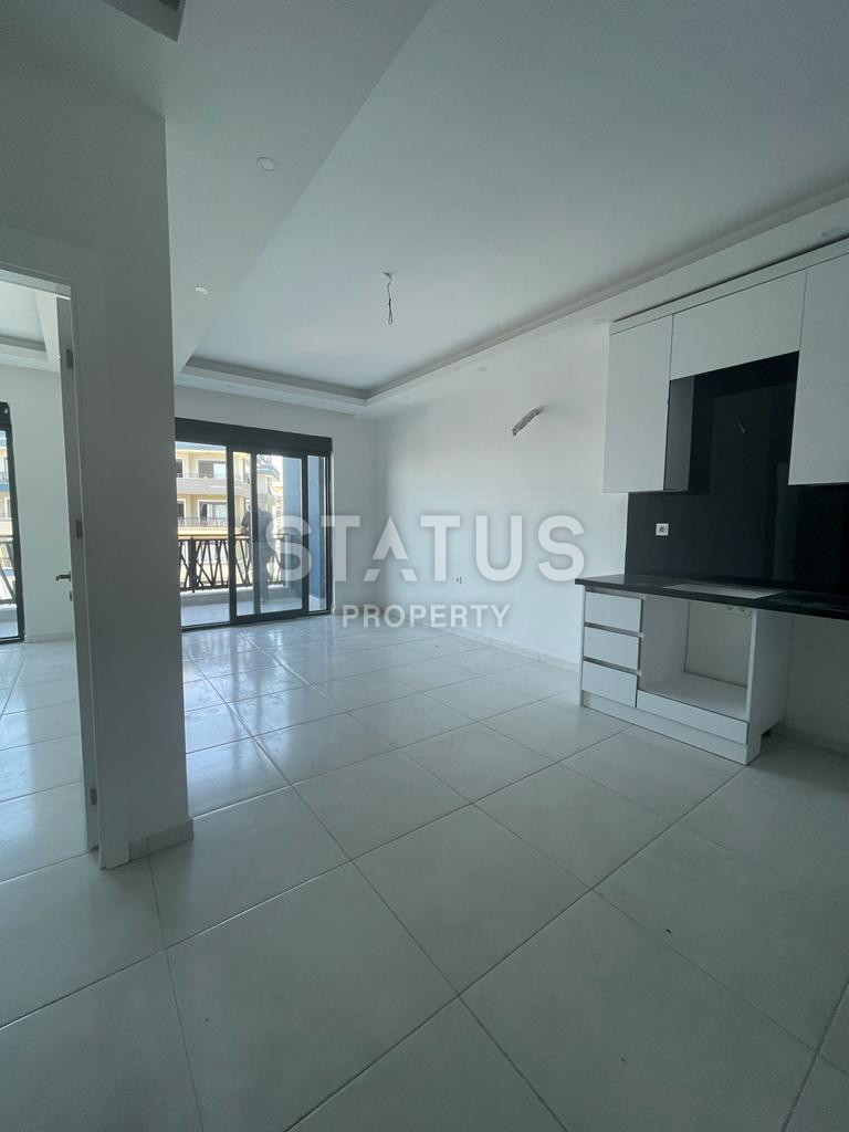 Двухкомнатная квартира в ЖК с отельной инфраструктурой в 600м от моря в Махмутларе. 60м2 фото 6