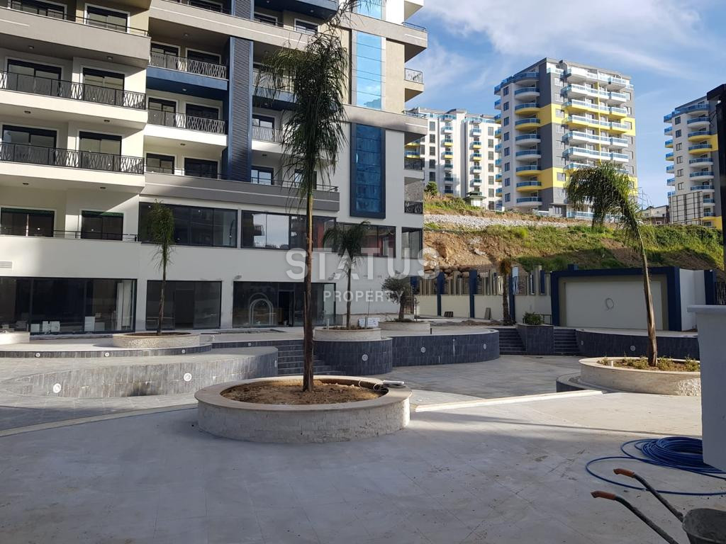 Двухкомнатная квартира в ЖК с отельной инфраструктурой в 600м от моря в Махмутларе. 60м2 фото 9