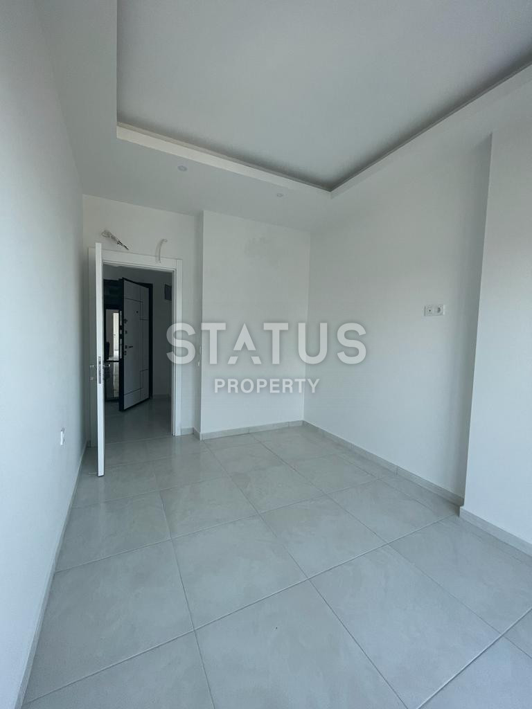 Двухкомнатная квартира в ЖК с отельной инфраструктурой в 600м от моря в Махмутларе. 60м2 фото 15