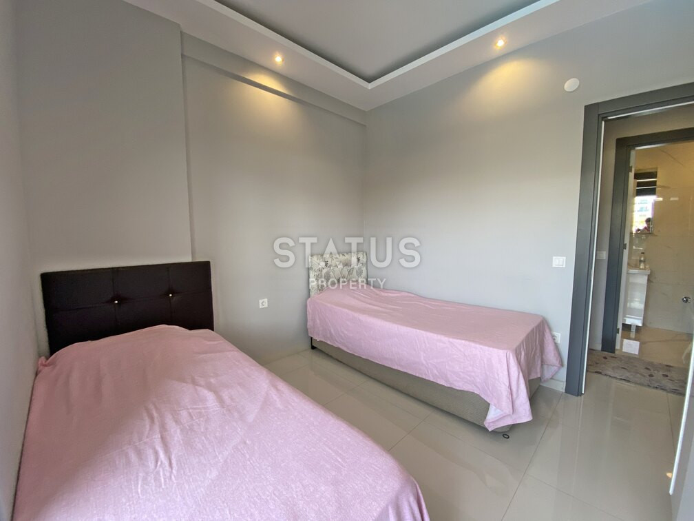 Garden duplex 2+1 at 250 250m from the sea in a residential complex with full infrastructure in Kargicak. 106m2. фото 4