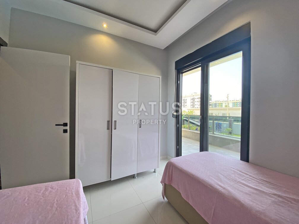 Garden duplex 2+1 at 250 250m from the sea in a residential complex with full infrastructure in Kargicak. 106m2. фото 5