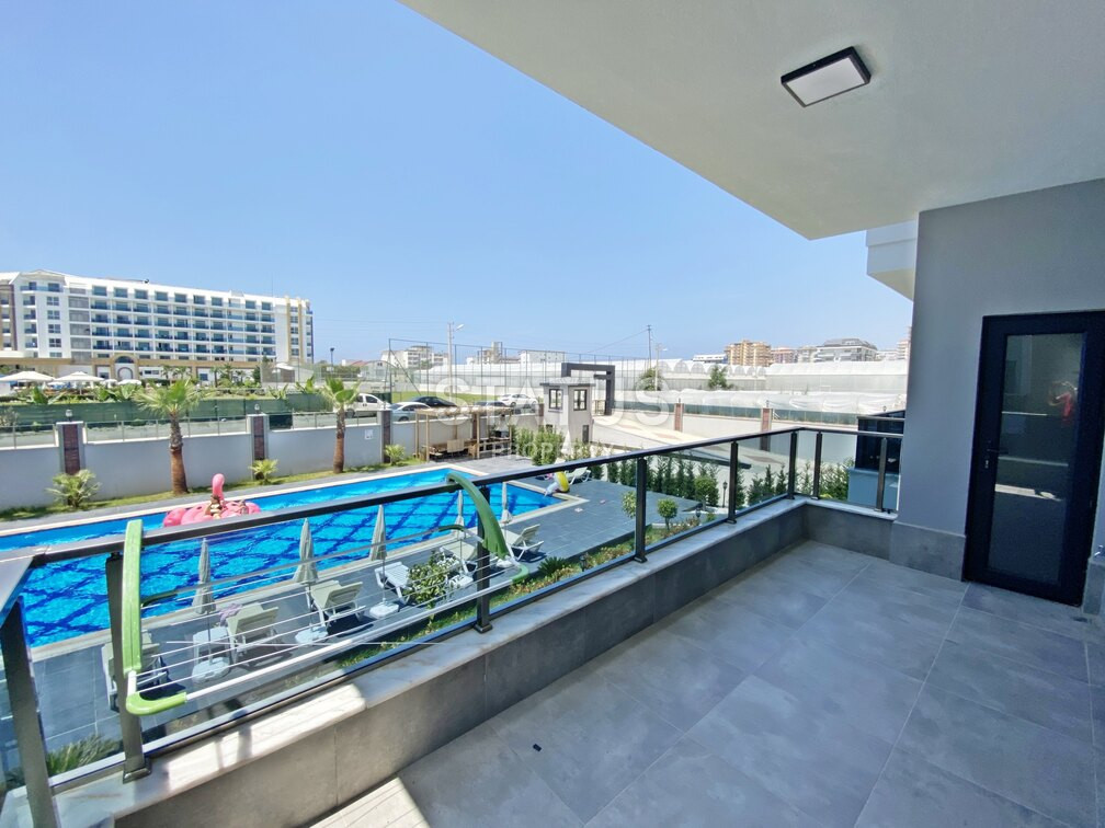 Garden duplex 2+1 at 250 250m from the sea in a residential complex with full infrastructure in Kargicak. 106m2. фото 9