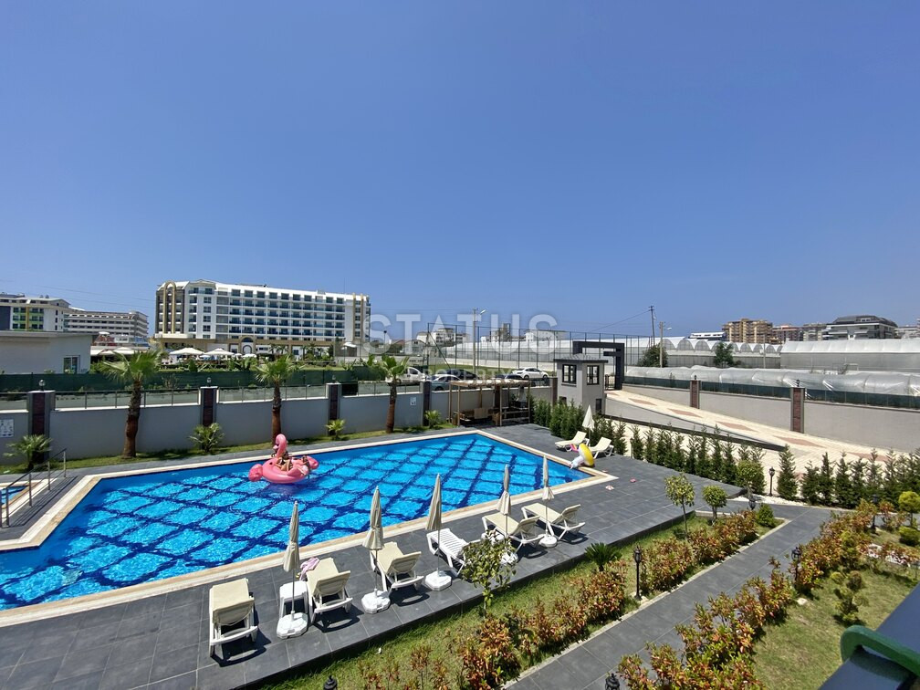 Garden duplex 2+1 at 250 250m from the sea in a residential complex with full infrastructure in Kargicak. 106m2. фото 12