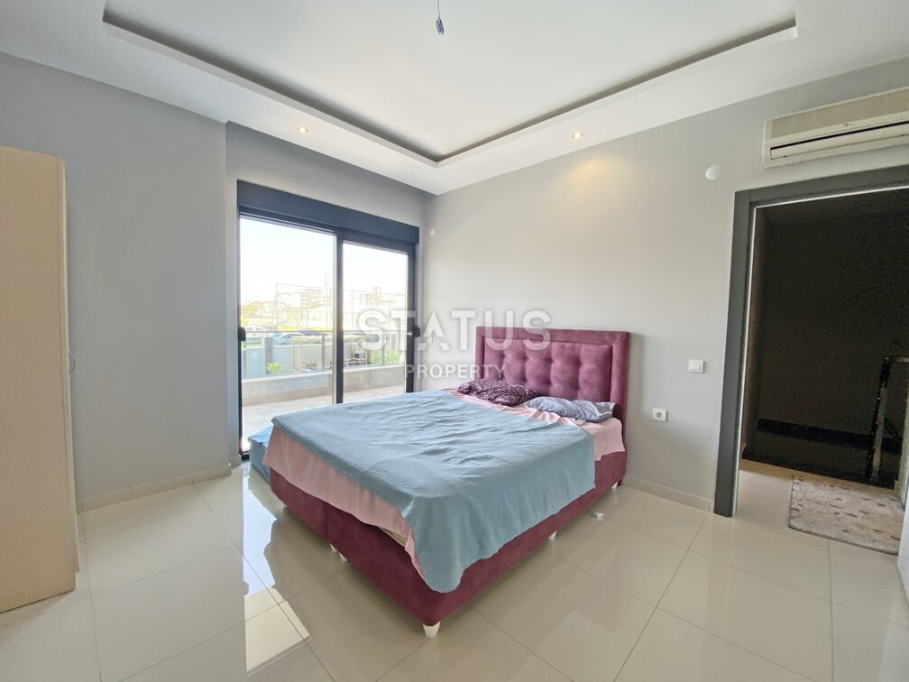 Garden duplex 2+1 at 250 250m from the sea in a residential complex with full infrastructure in Kargicak. 106m2. фото 13