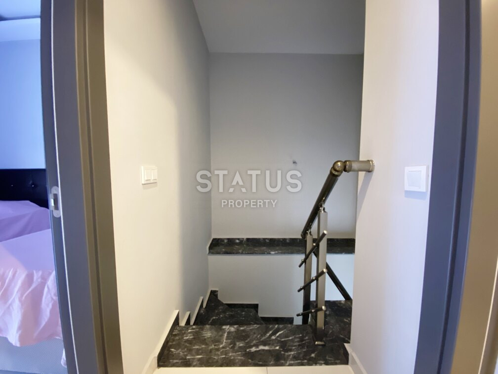 Garden duplex 2+1 at 250 250m from the sea in a residential complex with full infrastructure in Kargicak. 106m2. фото 14