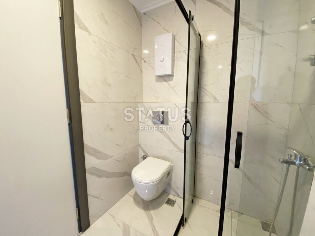 Garden duplex 2+1 at 250 250m from the sea in a residential complex with full infrastructure in Kargicak. 106m2. фото 15