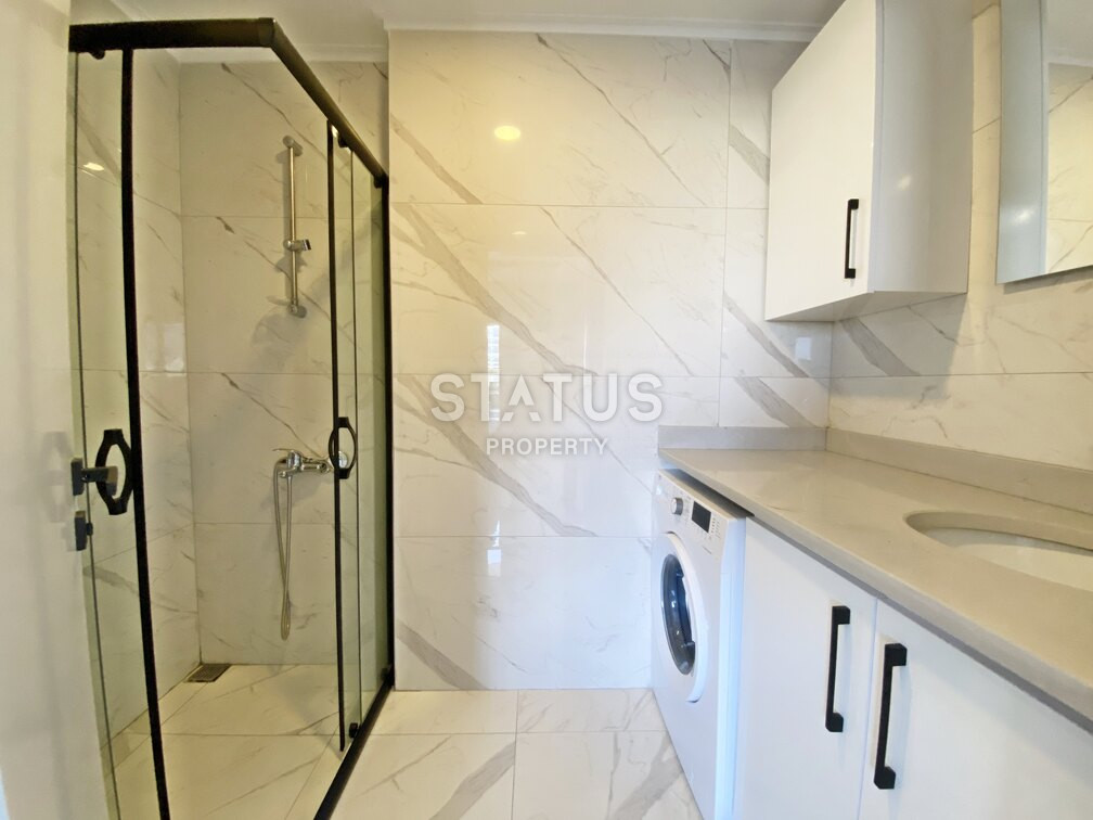 Garden duplex 2+1 at 250 250m from the sea in a residential complex with full infrastructure in Kargicak. 106m2. фото 17