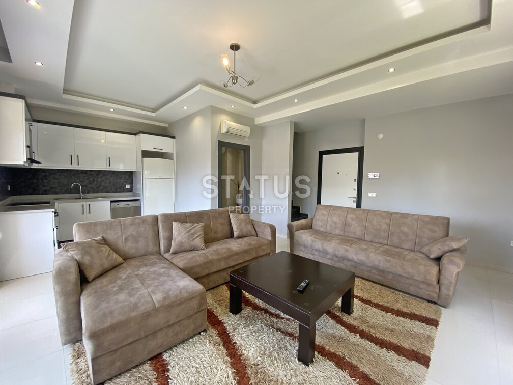 Garden duplex 2+1 at 250 250m from the sea in a residential complex with full infrastructure in Kargicak. 106m2. фото 18