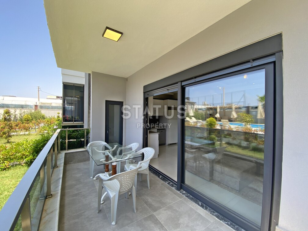 Garden duplex 2+1 at 250 250m from the sea in a residential complex with full infrastructure in Kargicak. 106m2. фото 23