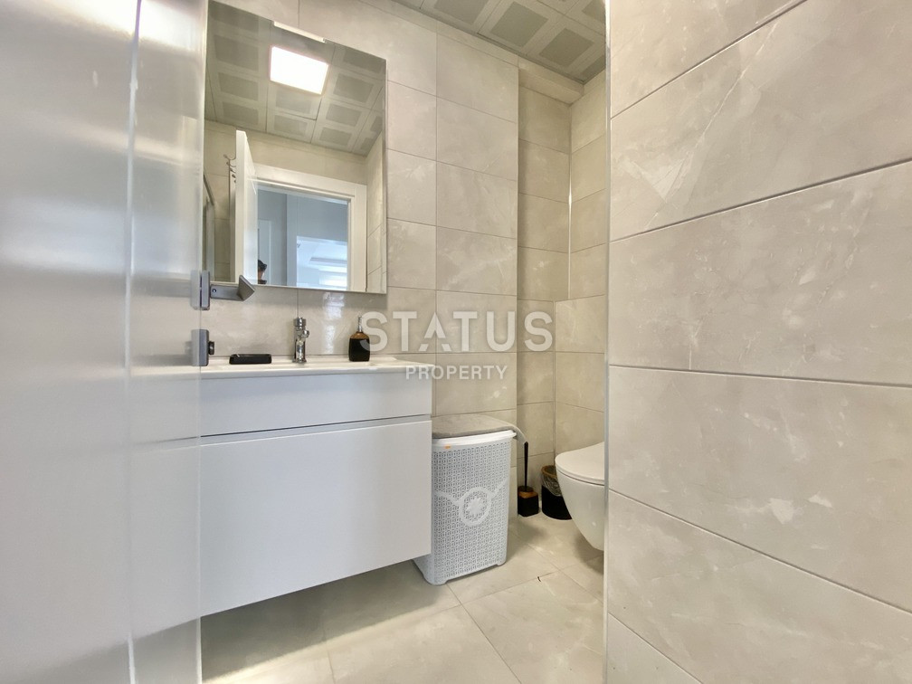 Уютная светлая трёхкомнатная квартира в первой береговой линии в Махмутларе. 85м2 фото 3