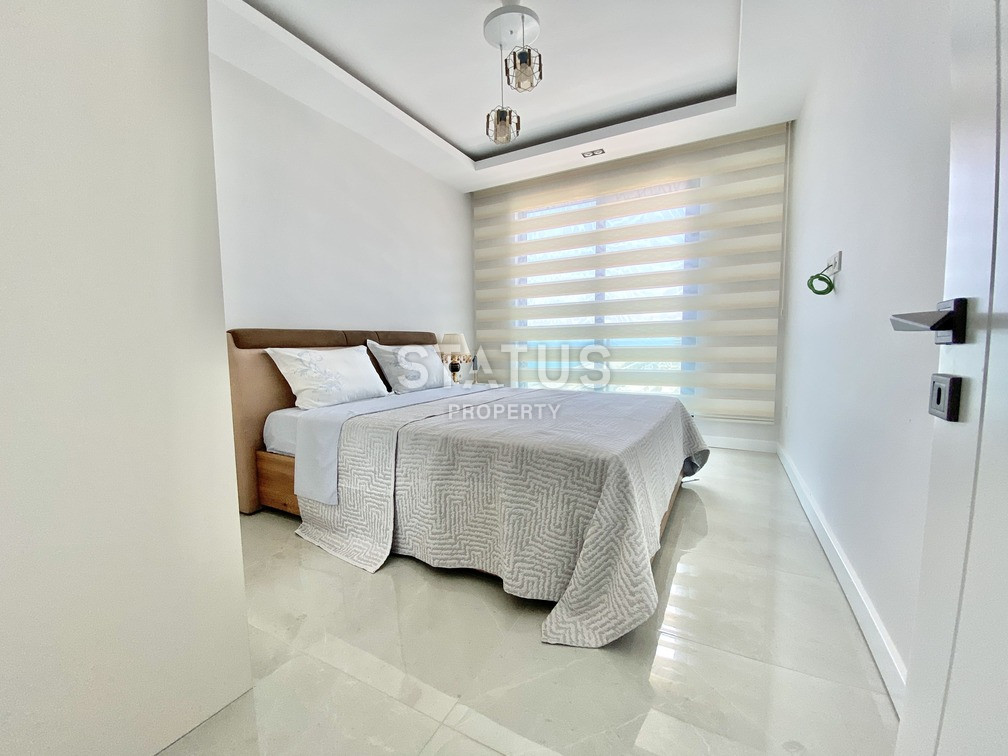 Уютная светлая трёхкомнатная квартира в первой береговой линии в Махмутларе. 85м2 фото 4