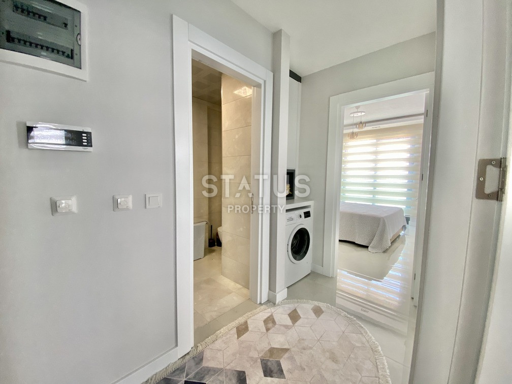 Уютная светлая трёхкомнатная квартира в первой береговой линии в Махмутларе. 85м2 фото 7