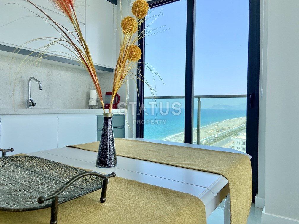 Уютная светлая трёхкомнатная квартира в первой береговой линии в Махмутларе. 85м2 фото 12