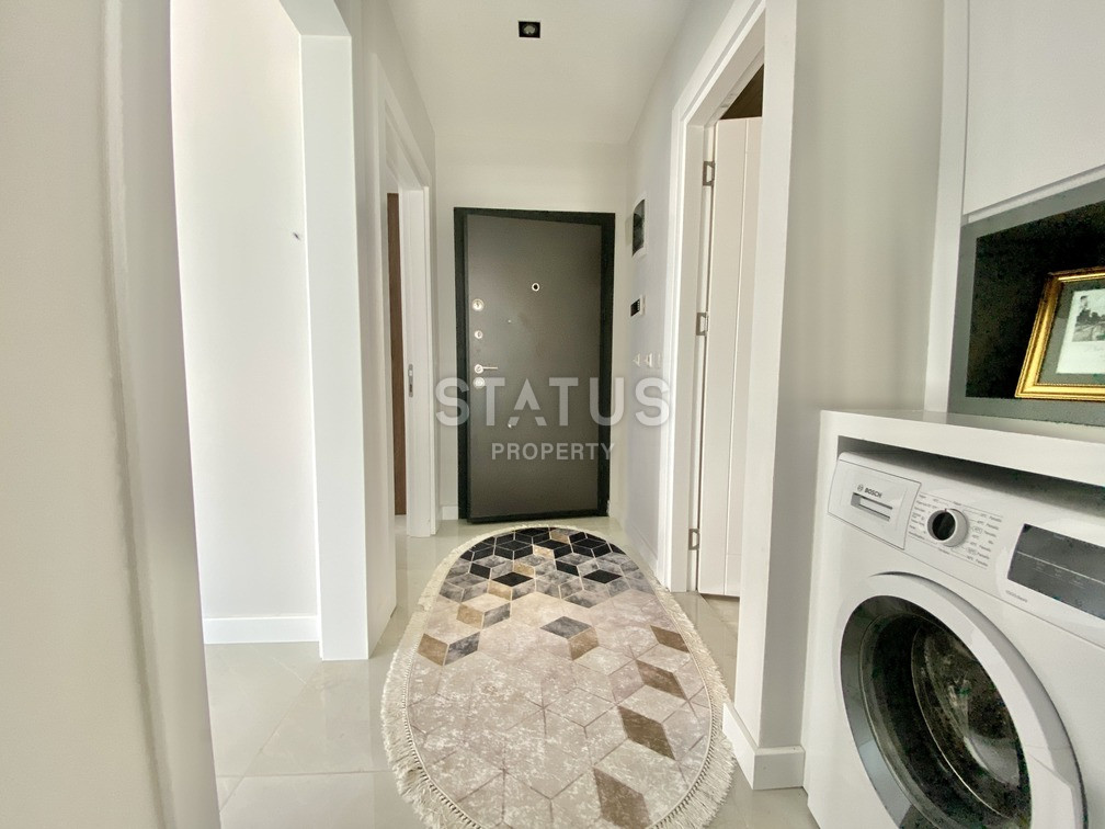 Уютная светлая трёхкомнатная квартира в первой береговой линии в Махмутларе. 85м2 фото 13