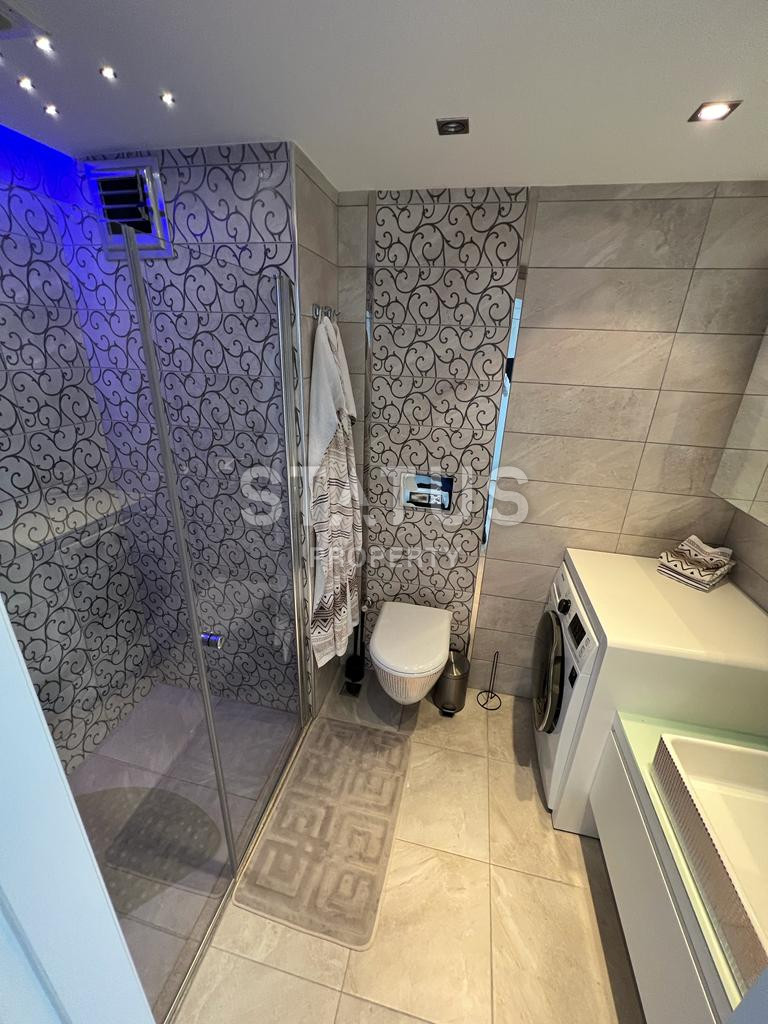 Трехкомнатные апартаменты в комплексе премиум класса в самом центре Алании в 250 метрах от пляжа Клеопатры. 190м2 фото 11