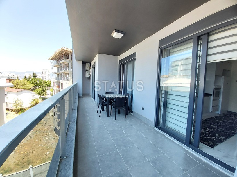 Three-room furnished apartment with a separate kitchen in a residential complex in Mahmutlar. 130m2 фото 15
