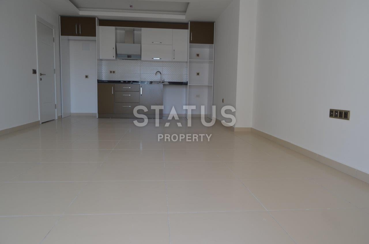 Двухкомнатная квартира в новом комплексе в Махмутларе, 68 м2 фото 13