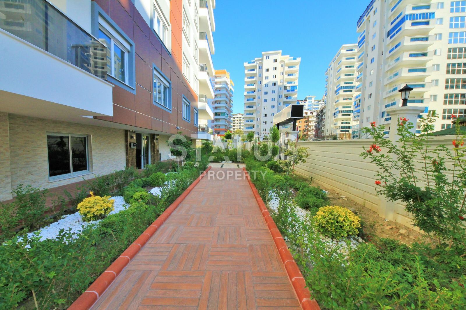 Двухкомнатная квартира в новом комплексе в Махмутларе, 65 м2 фото 13