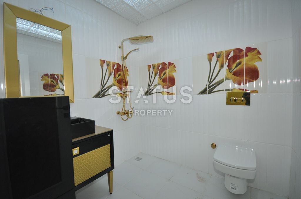 Меблированная просторная двухкомнатная квартира в комплексе с бассейном в Махмутларе, 75 м2. фото 20