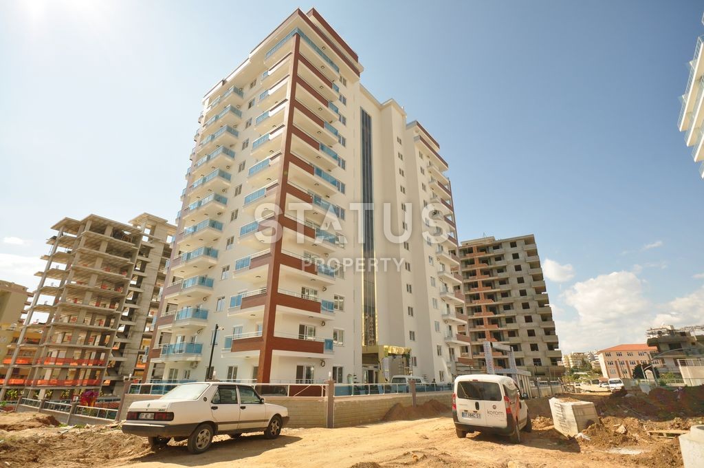 Меблированная просторная двухкомнатная квартира в комплексе с бассейном в Махмутларе, 75 м2. фото 26