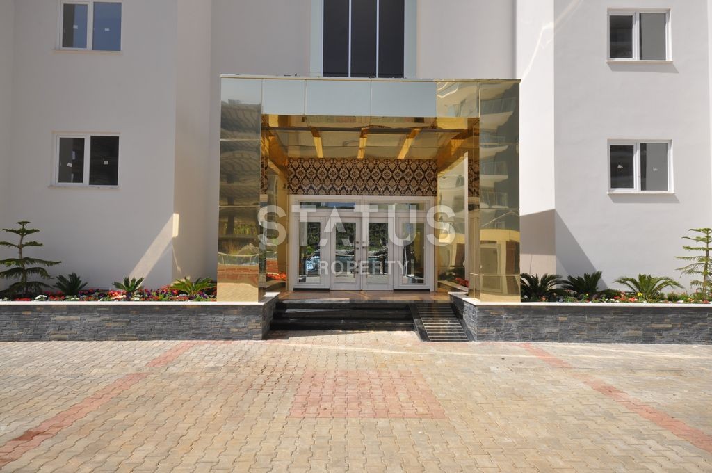 Меблированная просторная двухкомнатная квартира в комплексе с бассейном в Махмутларе, 75 м2. фото 23