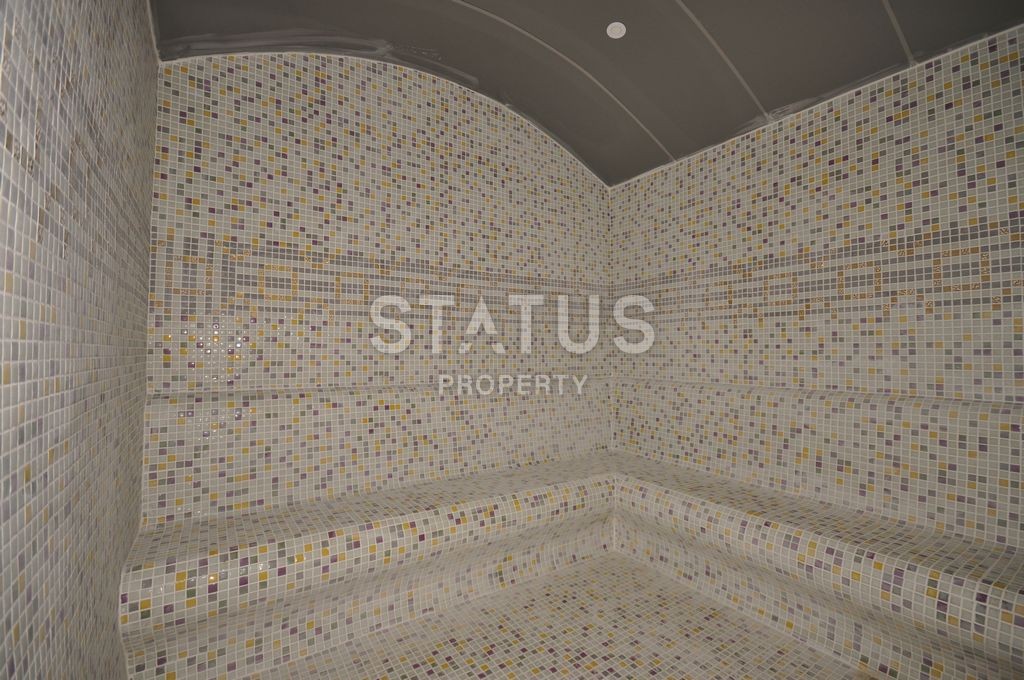 Меблированная просторная двухкомнатная квартира в комплексе с бассейном в Махмутларе, 75 м2. фото 19