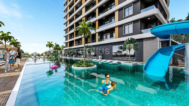 Проект долевого строительства в Авсалларе с полной инфраструктурой, частным пляжем, трансфером до моря. 64м2 – 119м2 фото 7