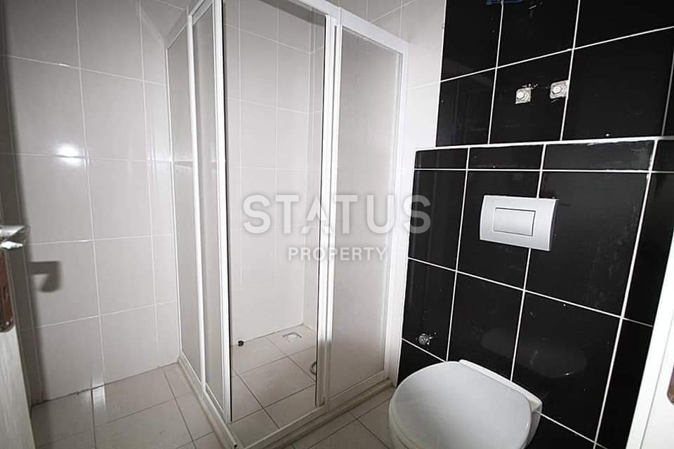 Недорогая двухкомнатная квартира в новом комплексе с бассейном! Махмутлар! 70 кв. м. фото 16