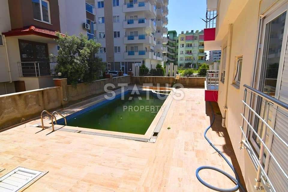 Недорогая двухкомнатная квартира в новом комплексе с бассейном! Махмутлар! 70 кв. м. фото 18