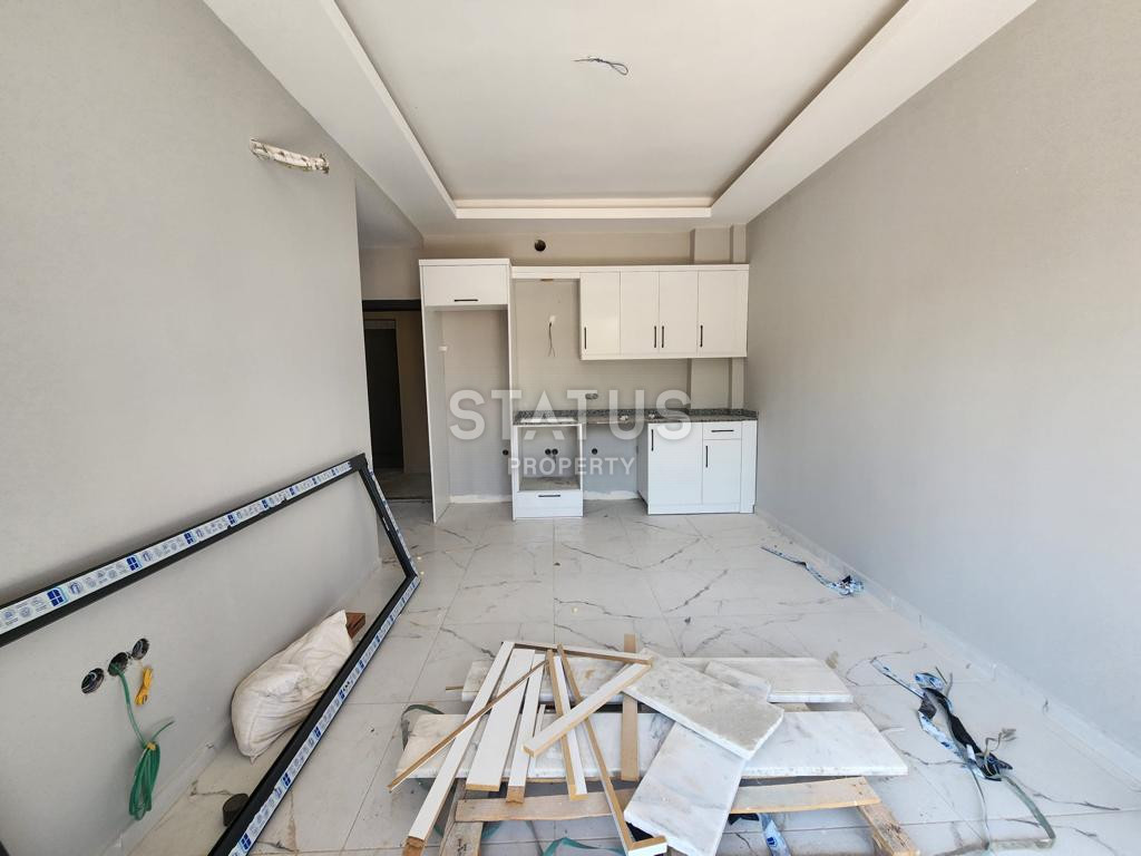Two-room apartment in the European district OBA in the house on the pre-delivery. 55m2 фото 3