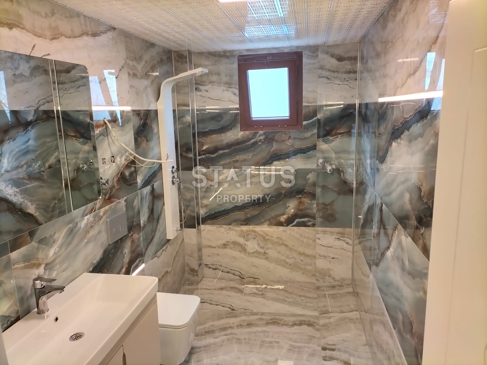 Дуплекс в центральной части Аланьи с видом на море в районе Буюкхасбахче. 140м2 фото 32