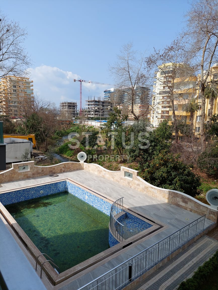 Трёхкомнатная квартира в Махмутларе в новом комплексе в 150м от моря, 95м2 фото 25