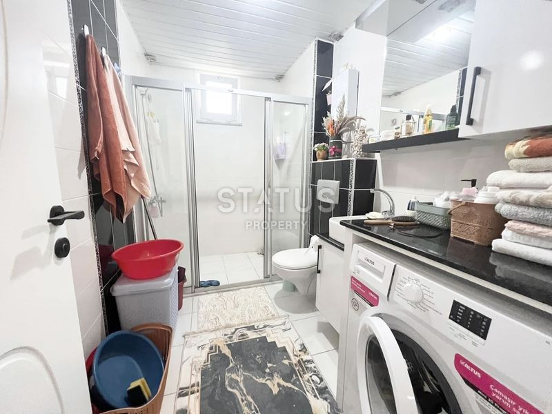 Апартаменты 1+1 в живописном районе Кестель, всего в 150 метрах от моря, 75 м2. фото 16